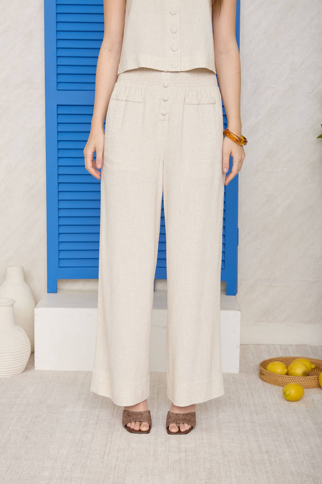 SMOCKED WAIST BUTTON DETAIL LINEN PANTS