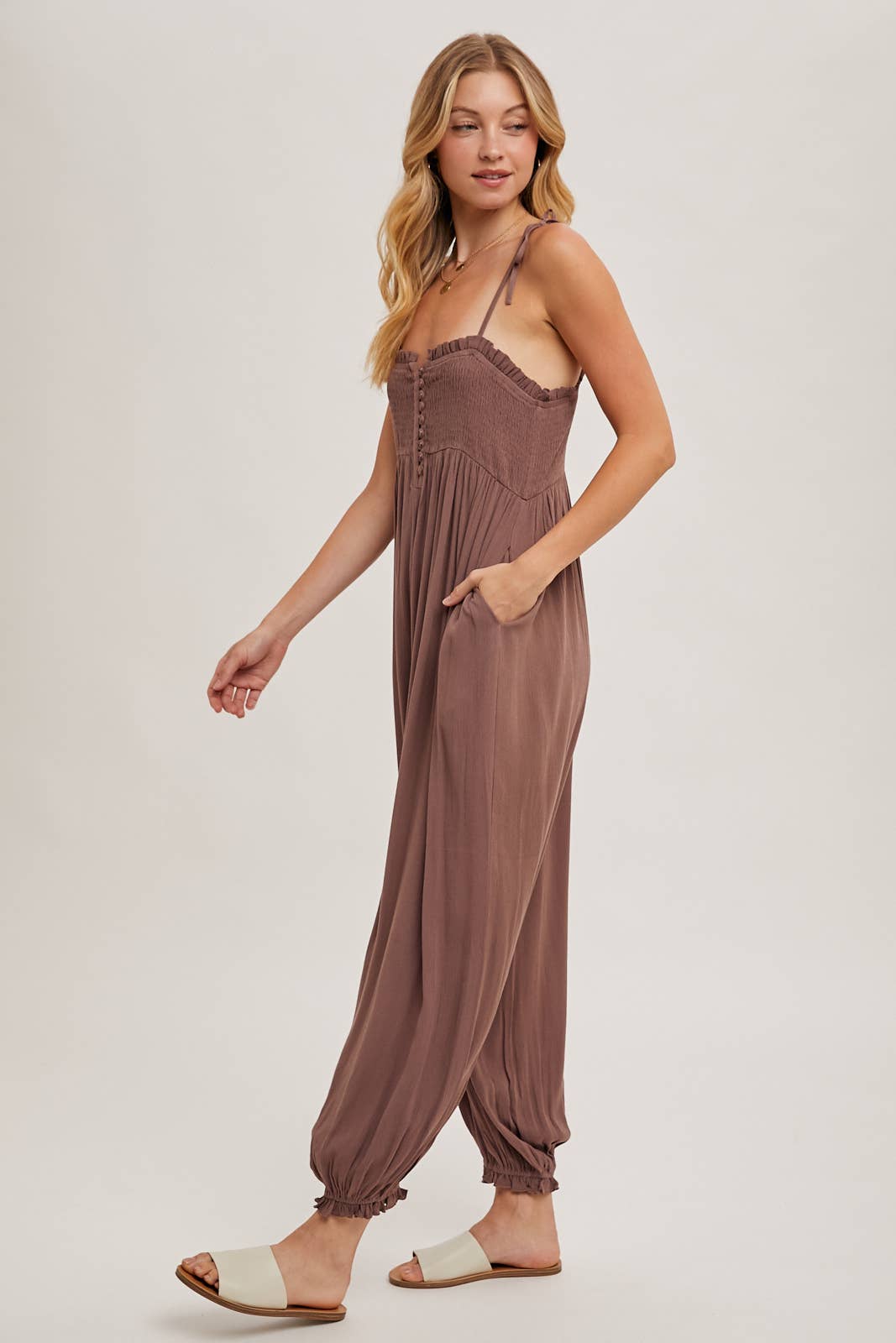 GAUZE SMOCKED BUTTON FRONT SHOULDER TIE JUMPSUIT